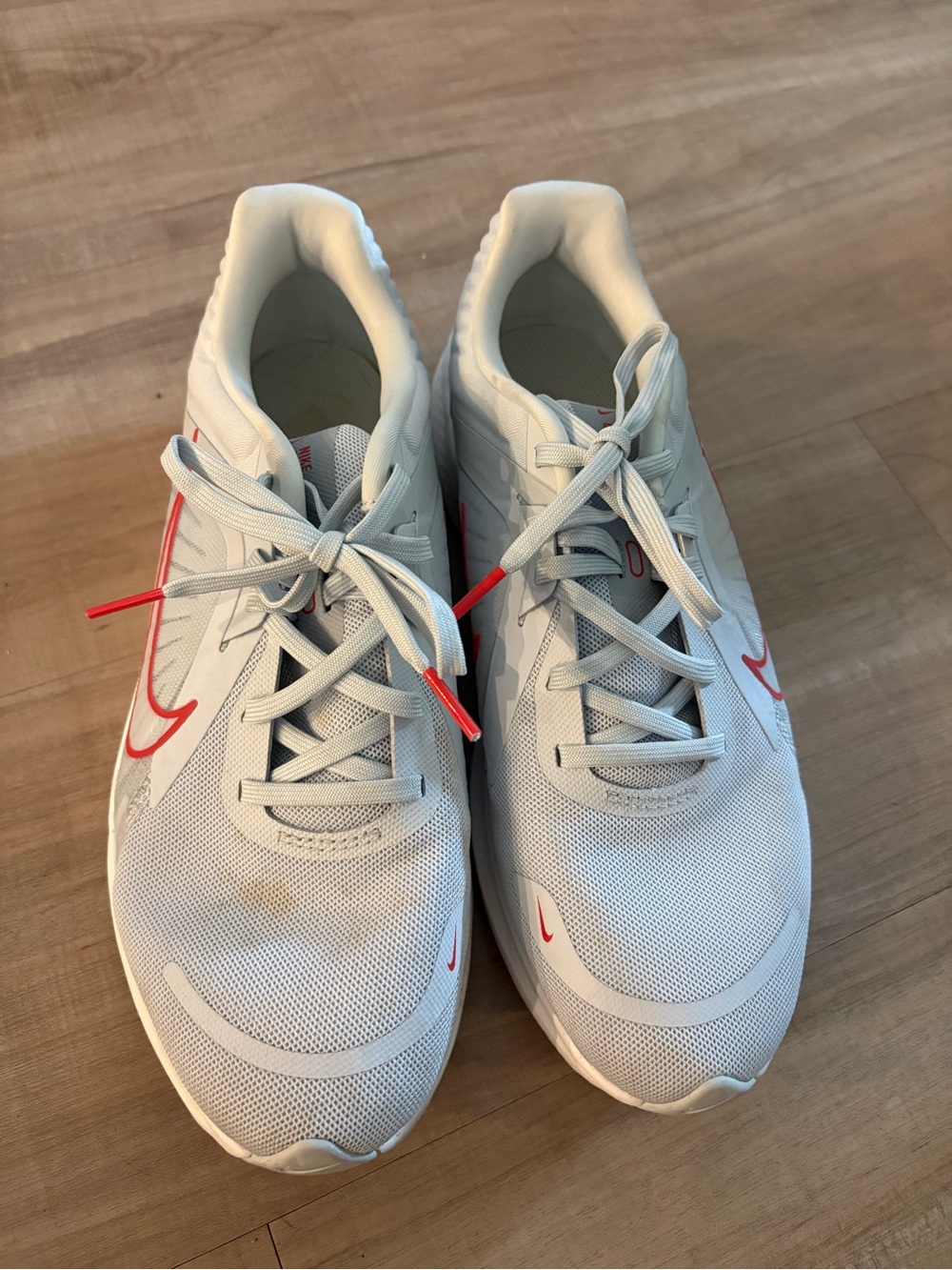 Nike Men’s White Sneakers with Red Accents